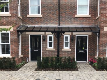 <p>Here is one of many double porches we built for Croudace Homes Ltd, at both their Burgess Hill and Hook sites. Featuring our ever-popular V8 columns and circles quarter arches, finished in black satin. </p>
