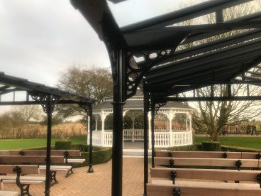 <p>This Kent wedding venue has alleviated concerns about the British weather with covered seating areas for guests in its beautiful grounds</p>
