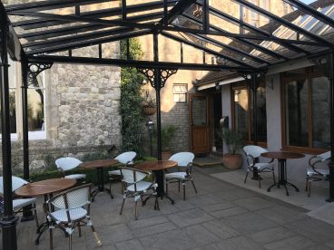 <p>Knowle Country House has now extended its outside seating area with a freestanding ridged roof structure at this beautiful Kent wedding venue</p>

