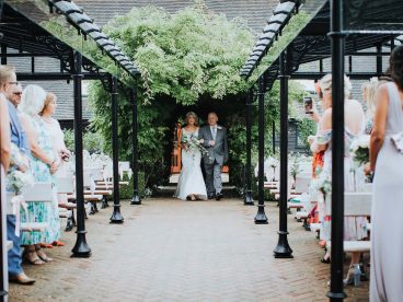 <p>We installed two large, freestanding structures at The Old Kent Barn wedding venue, to create an aisle and covered seating for guests. </p>
