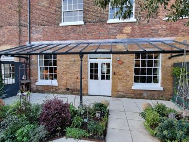 <p>This large lean-to verandah, featuring simple, Trumpet columns was installed in January 2023 for our lovely clients in Deal. </p>
